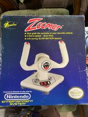 Zoomer | (LS
) (NES)